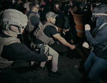 Immigration Protests New Jersey ICE agents use their baton as they clash with protesters outside the Delaney Hall detention center during a protest on Wednesday, May 27, 2026, in Newark, N.J.