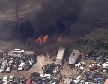 Firefighters battle a massive 2-alarm fire in North Philadelphia