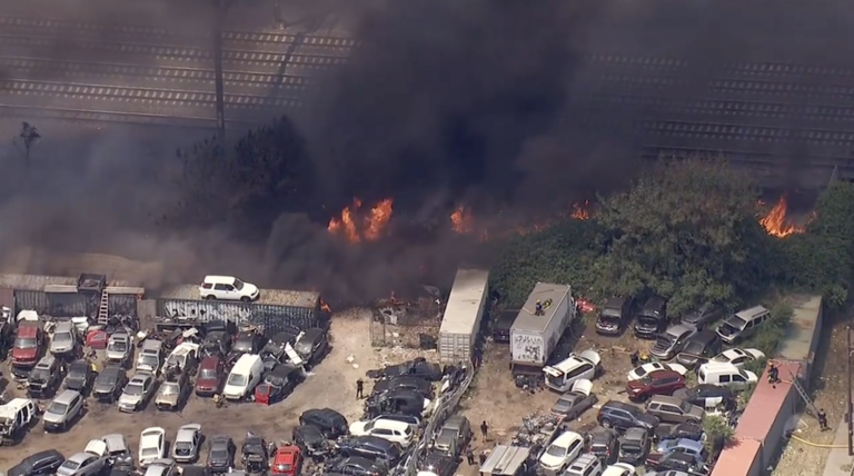 Firefighters battle a massive 2-alarm fire in North Philadelphia