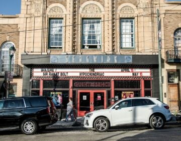 06-16-2026-k-paynter-quintessence-theatre-stills Quintessence Theatre js seen, in the middle of a busy city block.