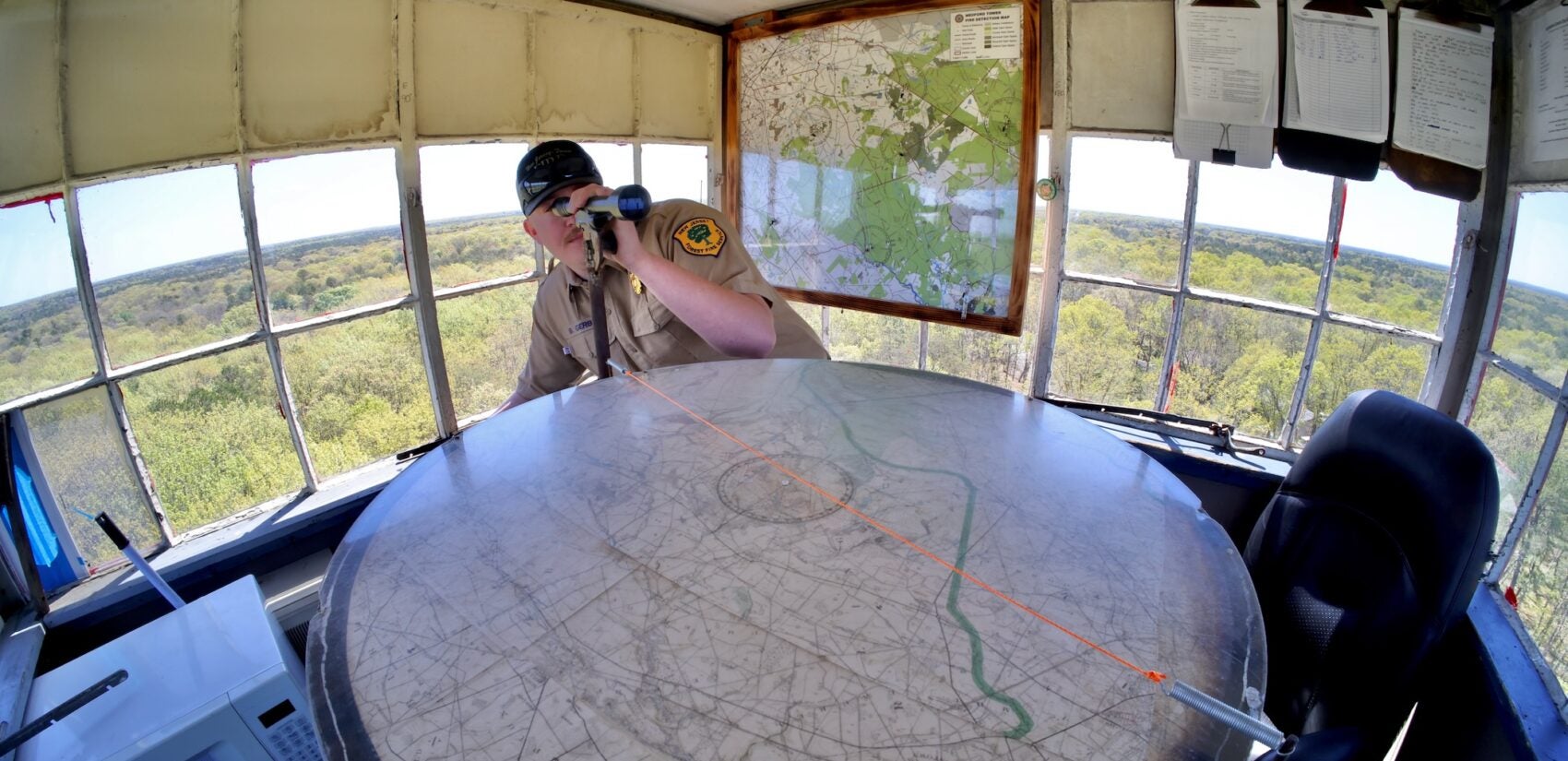 Brian Gerber at work up in the fire tower.
