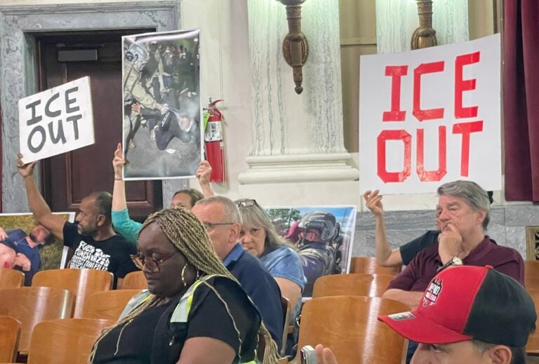 People sitting in the seats during a Trenton City Council hearing.