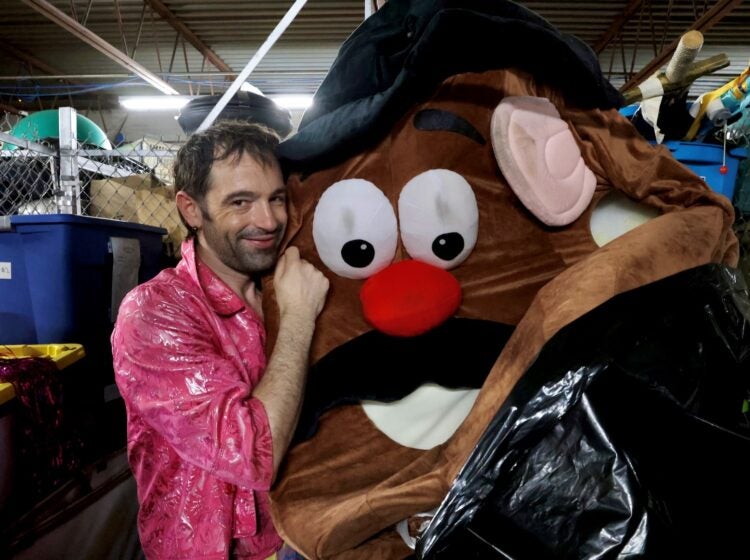 Rose Jarboe of the Bearded Ladies Cabaret cuddles a Mr. Potato Head costume