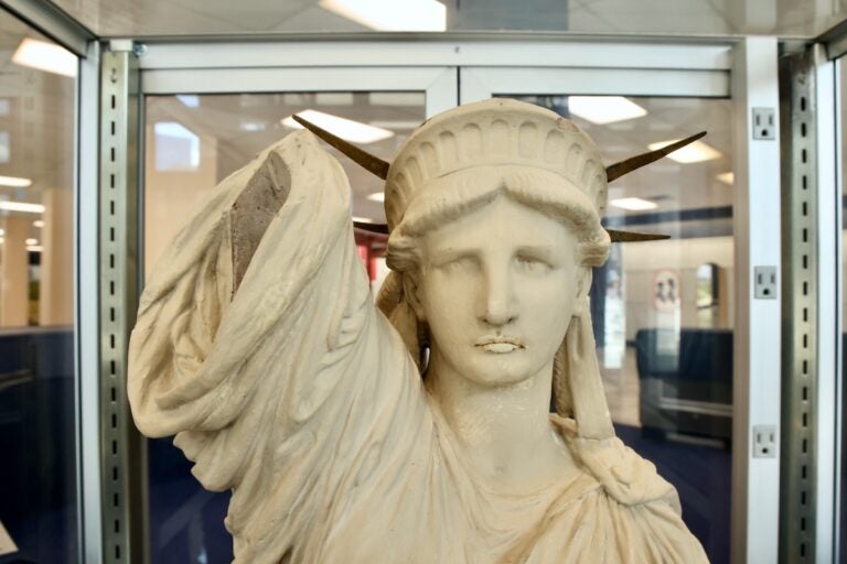 ''Revisit 1876'' includes artifacts from the Atwater Kent Collection of Drexel University, including Centennial souvenirs, images, books and records. (Emma Lee/WHYY)