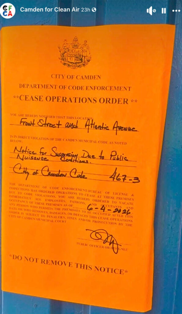 A screenshot of a photo showing the cease operations order at EMR's facility on Front Street and Atlantic Avenue