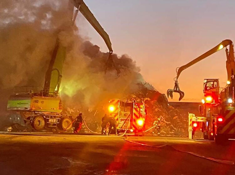 Firefighters working at the scene of a fire.