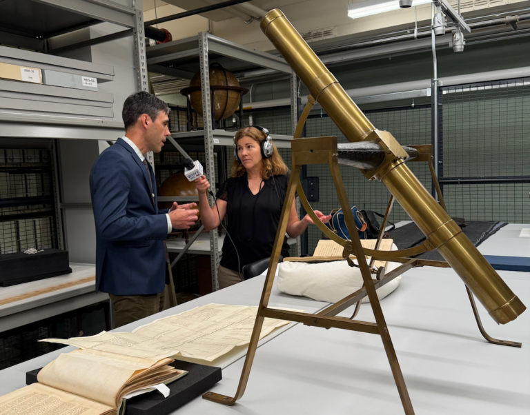 David Gary, the Associate Director of Collections at the American Philosophical Society, is showing Pulse Host Maiken Scott a telescope that was constructed by David Rittenhouse in the 18th Century. Rittenhouse used the telescope to track the Transit of Venus in 1769, just a few years before America declared independence from Great Britain.