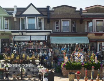 A vibrant, decked-out porch illustrates Cobbs Creek’s deeply-rooted civic pride.
