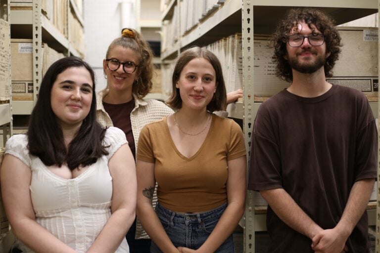 Adriana Criswell, professor Monika Julien, Harper Risch and Hayden Clark pose