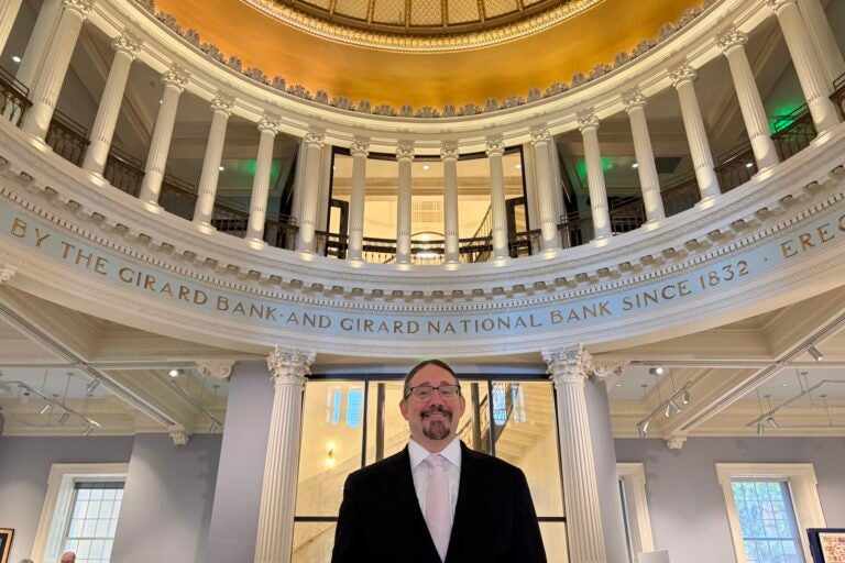 Joseph Angemi inside the bank.
