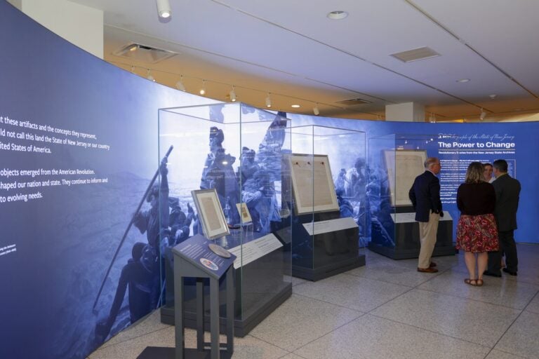 Documents and artifacts on display in the exhibit.