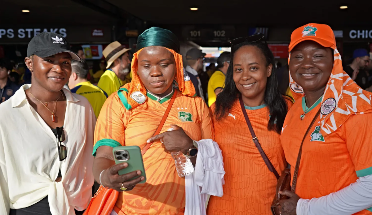 Orange-wearing fans supporting Côte d’Ivoire (from left) Koura Souma, Rokya Sylla, Mafi Soumahoro and Fanta Silla.
