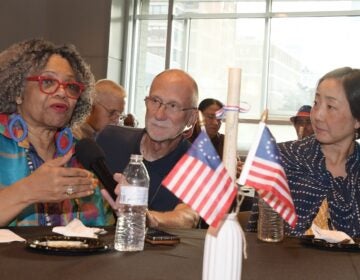 whyy-pursuit-of-happiness-01-062426 Event attendees engage in Q&A with the panel discussing the pursuit of happiness and the Declaration of Independence at WHYY.
