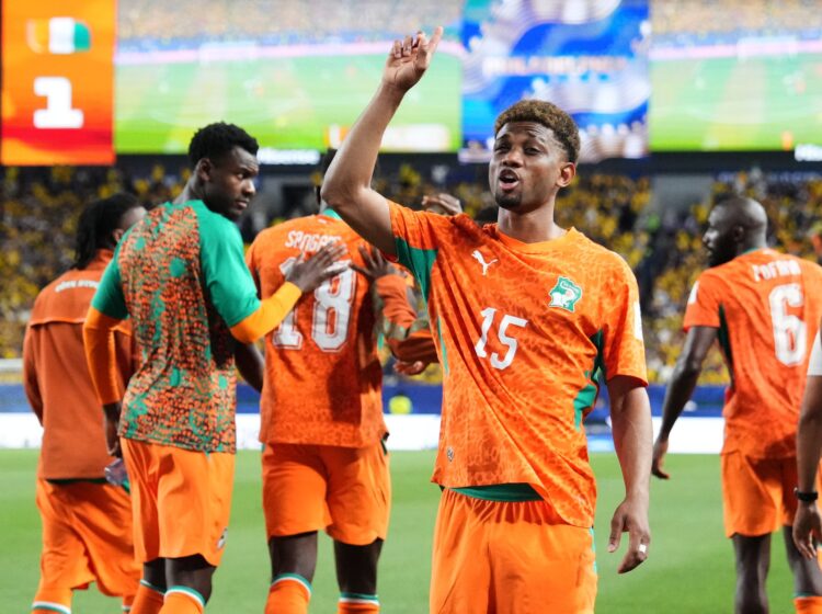 Ivory Coast's Amad Diallo (15) gestures to fans
