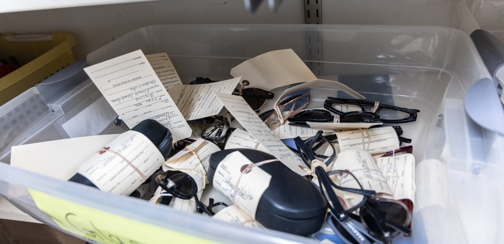 A bin of glasses found on Regional Rail at the lost and found in Suburban Station