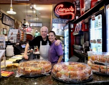 2026 06 16-e lee-michael campo mia campo-philadelphia old city campos deli-father daughter Michael and Mia Campo posing for a photo behind the counter at Campo's.