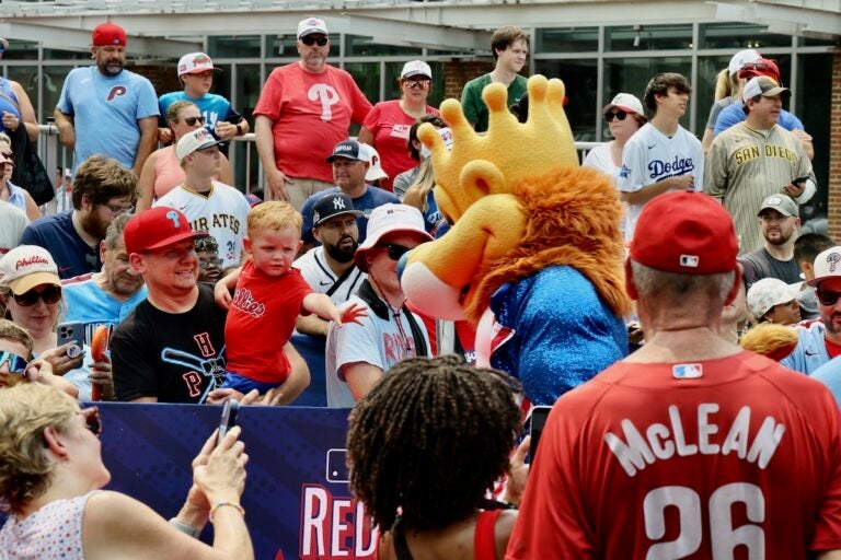 Fan interacts with mascot during 2026 All-Star Red Carpet Show