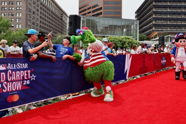 Phillie Phanatic clowns with fans at the 2026 All-Star Red Carpet Show on Independence Mall