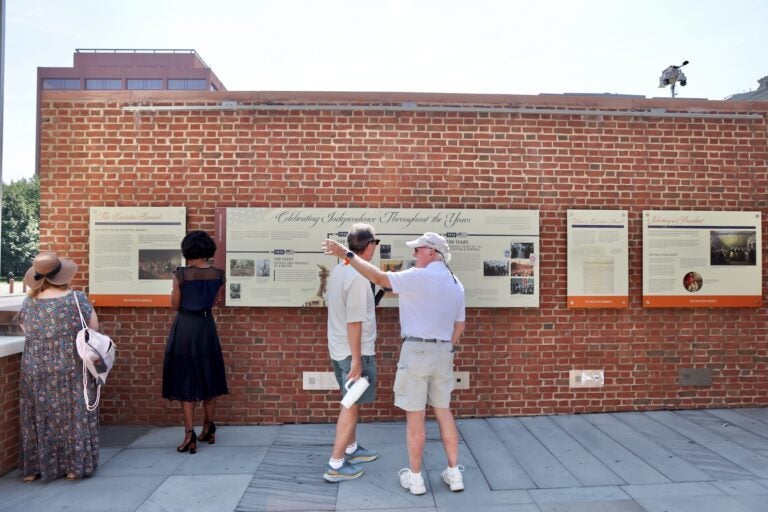Panels are hung up in the exhibit at the President's House.