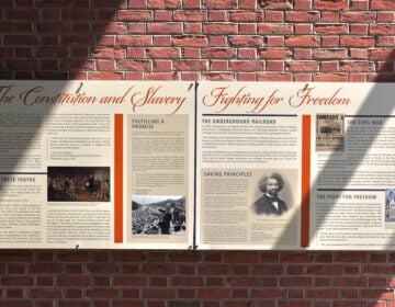 Panels are hung up in the exhibit at the President's House.