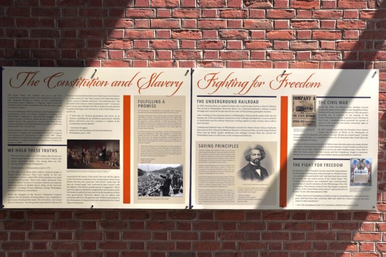 Panels are hung up in the exhibit at the President's House.