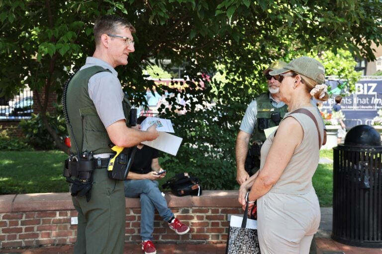 Officers engaging with Sandra Shachar-Krasnoff.