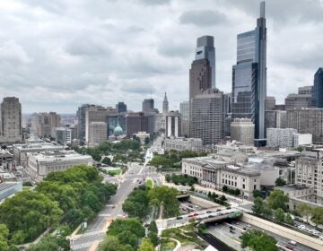 Aerial photo of the Philly skyline looking down the Parkway toward City Hall.