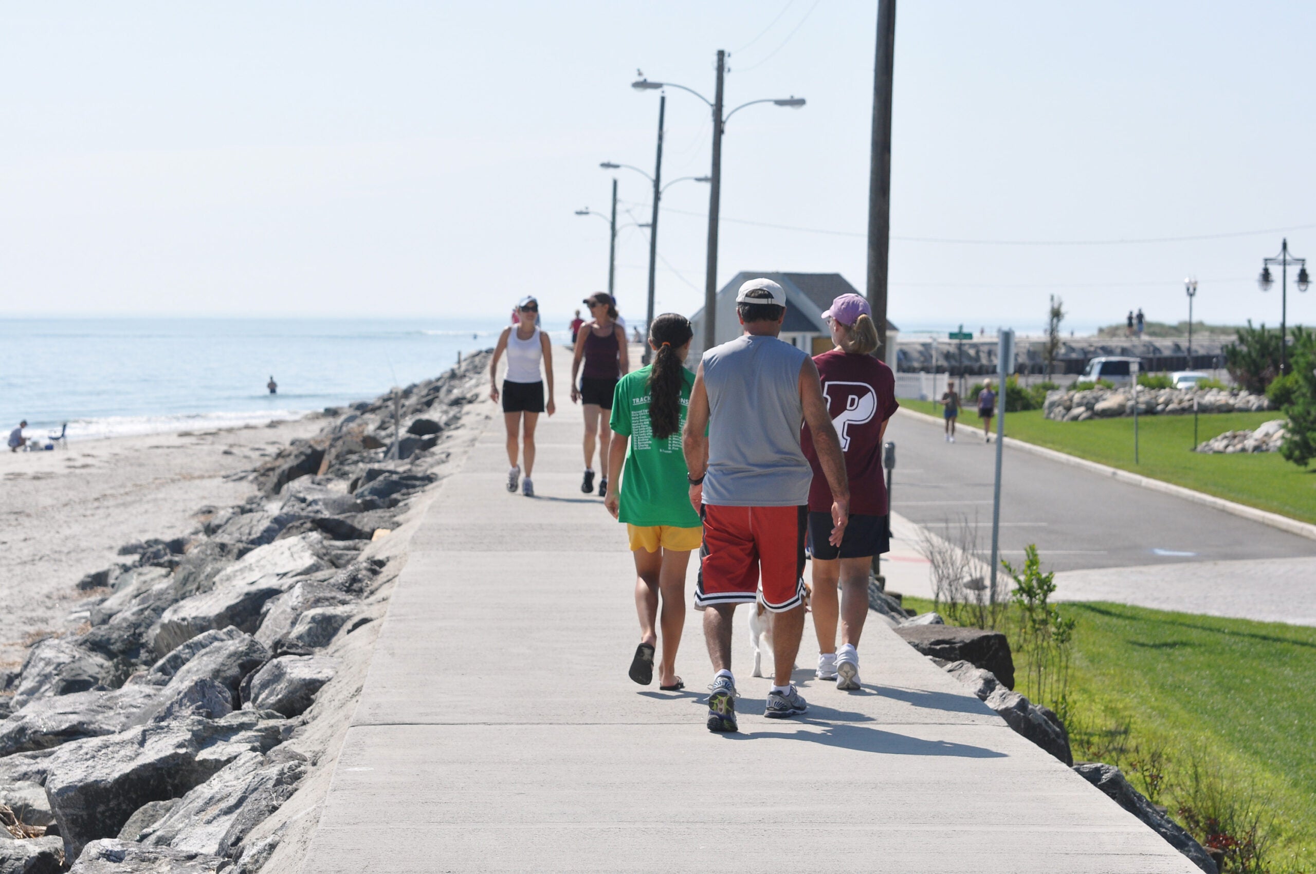 Families enjoying free beach access and affordable activities at the Jersey Shore