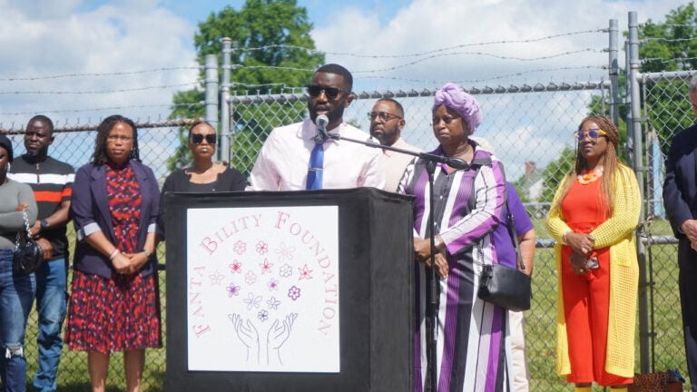 Siddiq Kamara speaks at a press conference