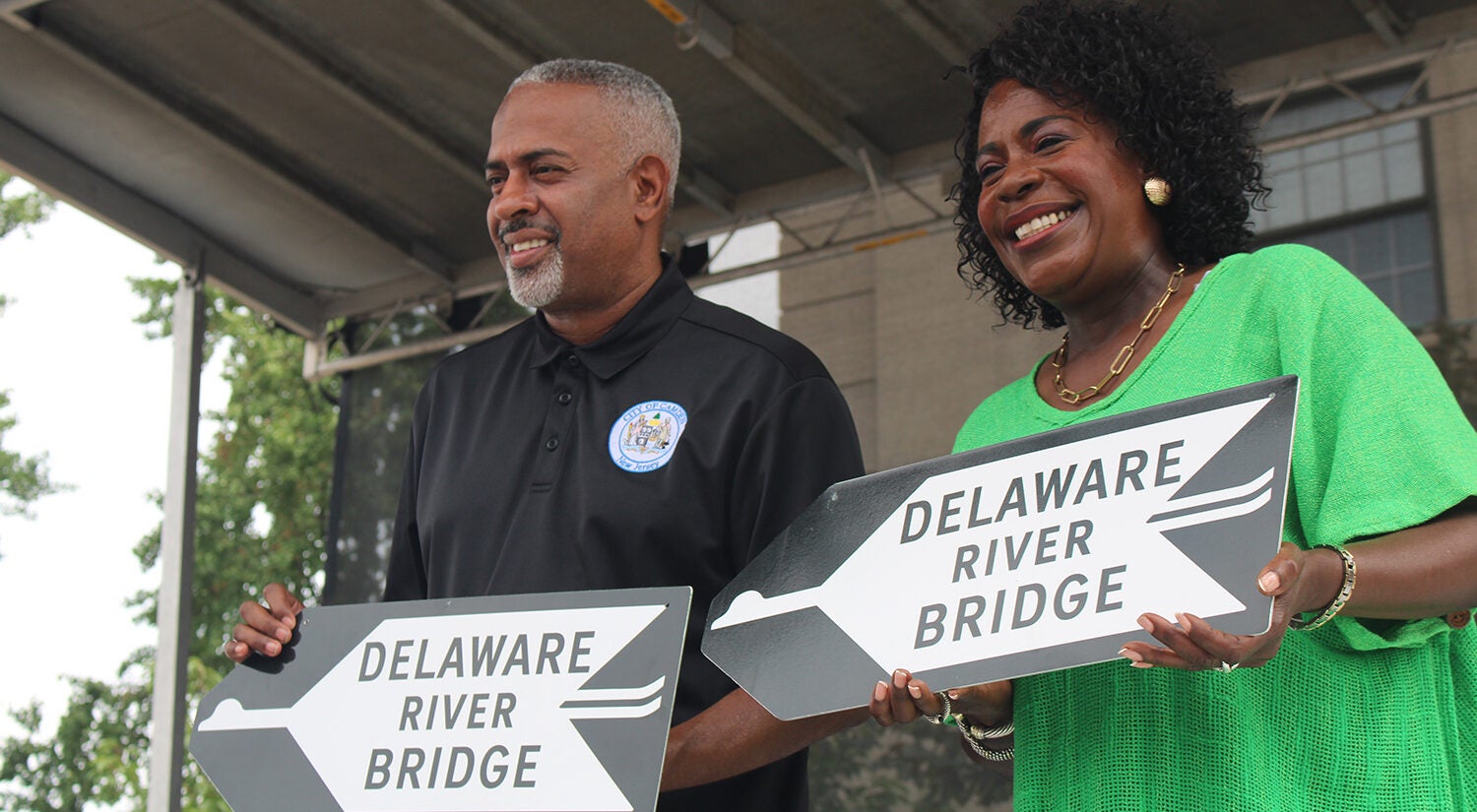 Camden Mayor Vic Carstarphen, left, and Philadelphia Mayor Cherelle Parker, right, pose for a photo