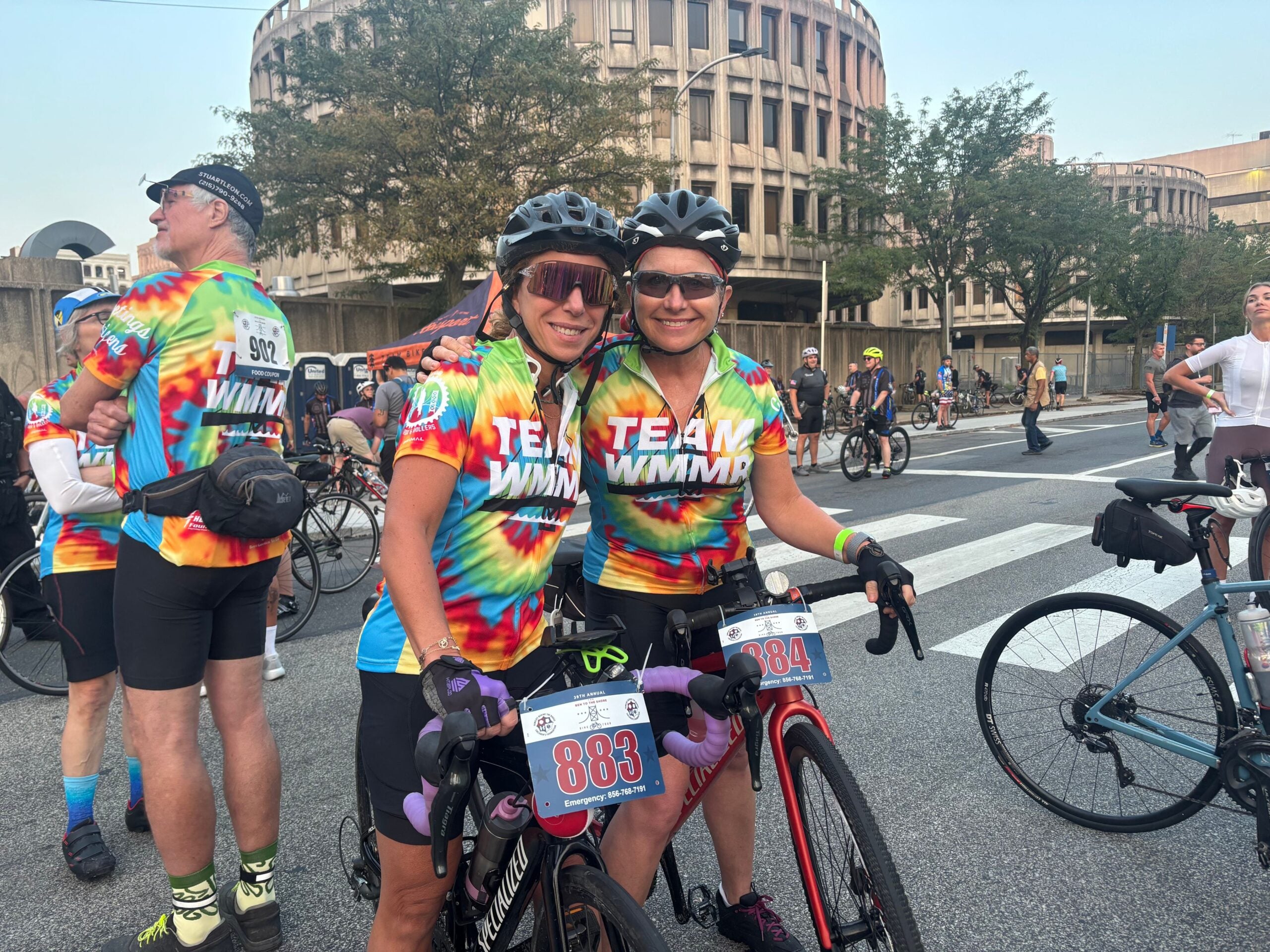 Mary Beth Fritz and Janis Fratamico smiling on bikes