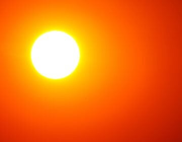 Blazing sun in the sky.