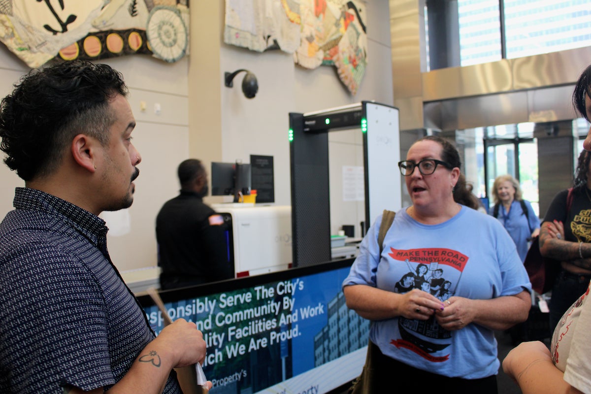 Two Immigrant rights advocates talking