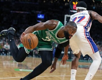 76ers Celtics Basketball Boston Celtics' Jaylen Brown drives past the Philadelphia 76ers' VJ Edgecombe