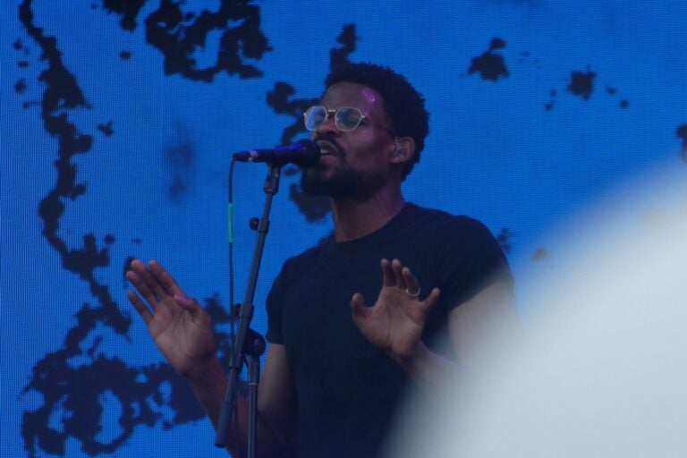 Infinity Song on stage performing on July 4 concert.