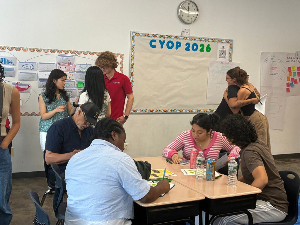 Members of the youth restorative justice cohort and community members fill out a “My Values Chart."