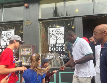 ryan-howard-phillies-charities-tree-house-books Former Philadelphia Phillies first basement Ryan Howard shakes the hands of children