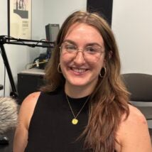 Sarina Grossi is sitting at her desk at WHYY offices.