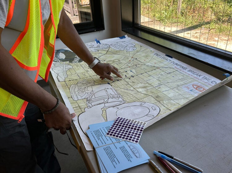 Pointing out spots on the map.