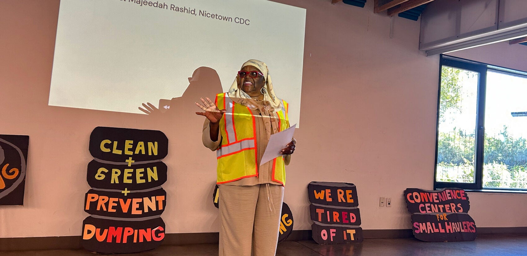 Majeedah Rashid giving a presentation in front of the group.