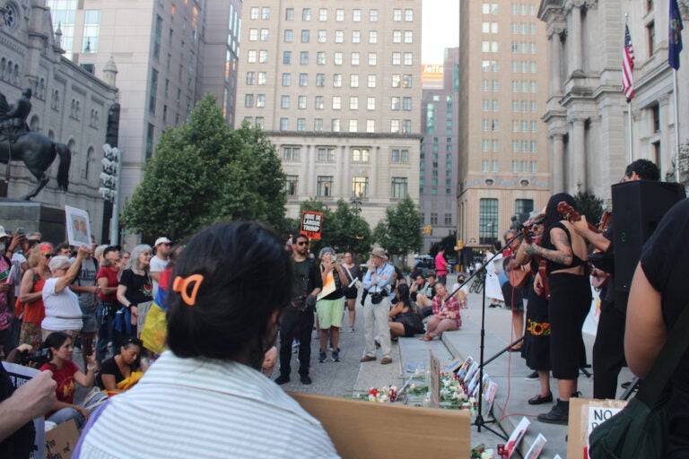 People at a vigil outside of Philadelphia City Hall.