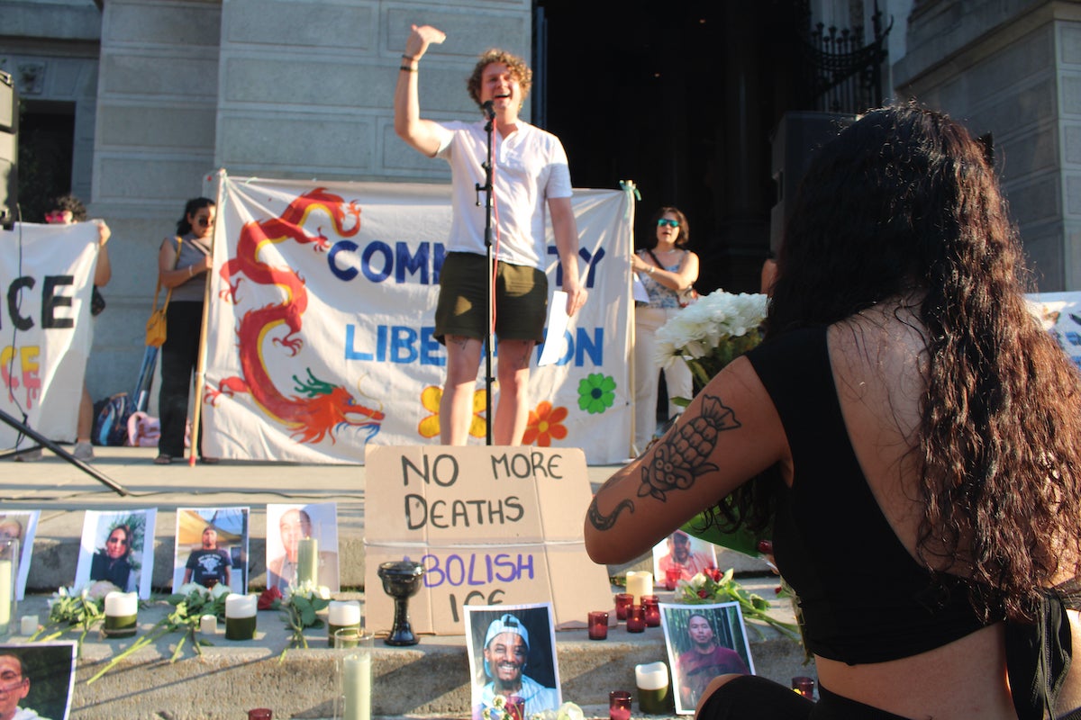 People at a vigil outside of Philadelphia City Hall.