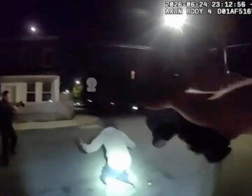 wilmington-police-shooting-2026-3 two officers pointing weapons at Kadir Skinner