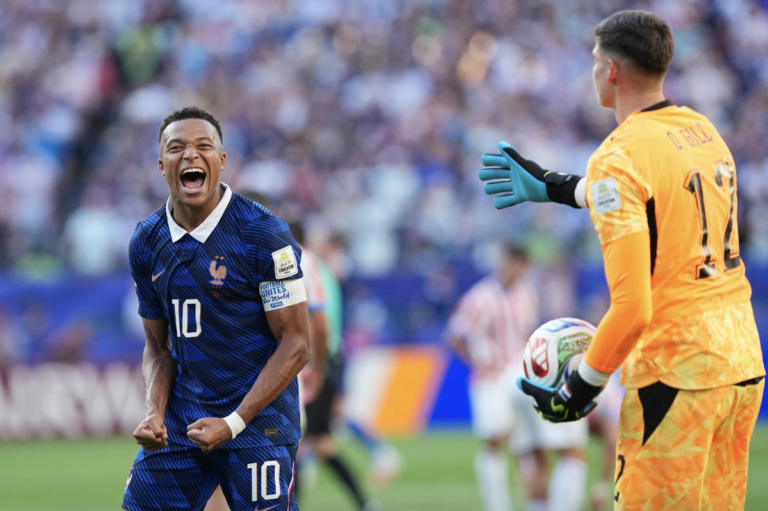 France's Kylian Mbappe (10) celebrates his team's victory at the end of the World Cup round of 16 soccer match between Paraguay and France in Philadelphia, Saturday, July 4, 2026.