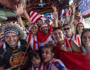 world-cup-paraguay-france-kpaynter-2026-07-04-1 Paraguay fans cheer on their team during the game.