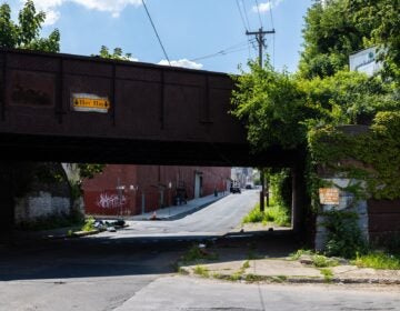 A sign posted by North10 on the bridge at 9th and West Ontario streets