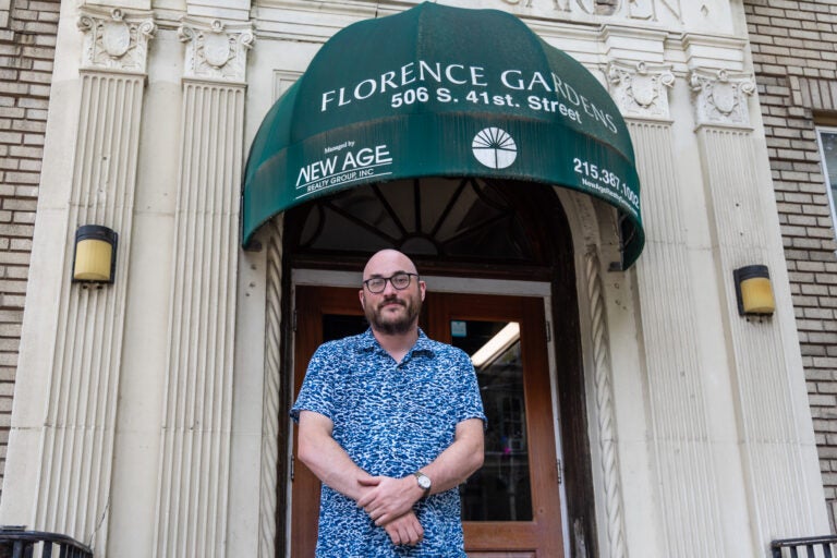 Jared Winters stands in front of Florence Gardens