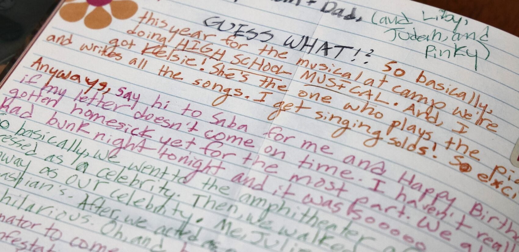 a handwritten note to a camper's parents