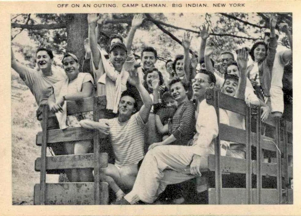 A 1940 postcard shows campers on the back of a truck