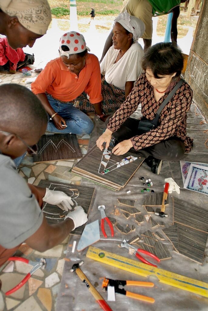 Lily Yeh teaches mosaic art to Rwandans